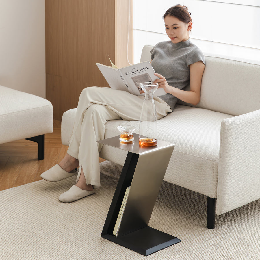 Minimalist stainless steel side table zig primary product view.