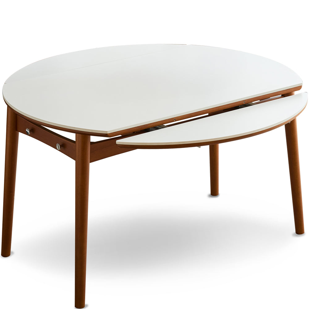 Vintage sintered stone extendable dining table minima in white background.