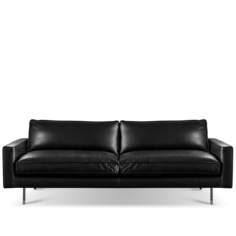 Minimalist Microfiber Leather 3 seater sofa unique in white background.