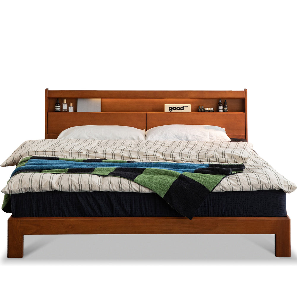 Vintage boxwood bed accompany light in white background.