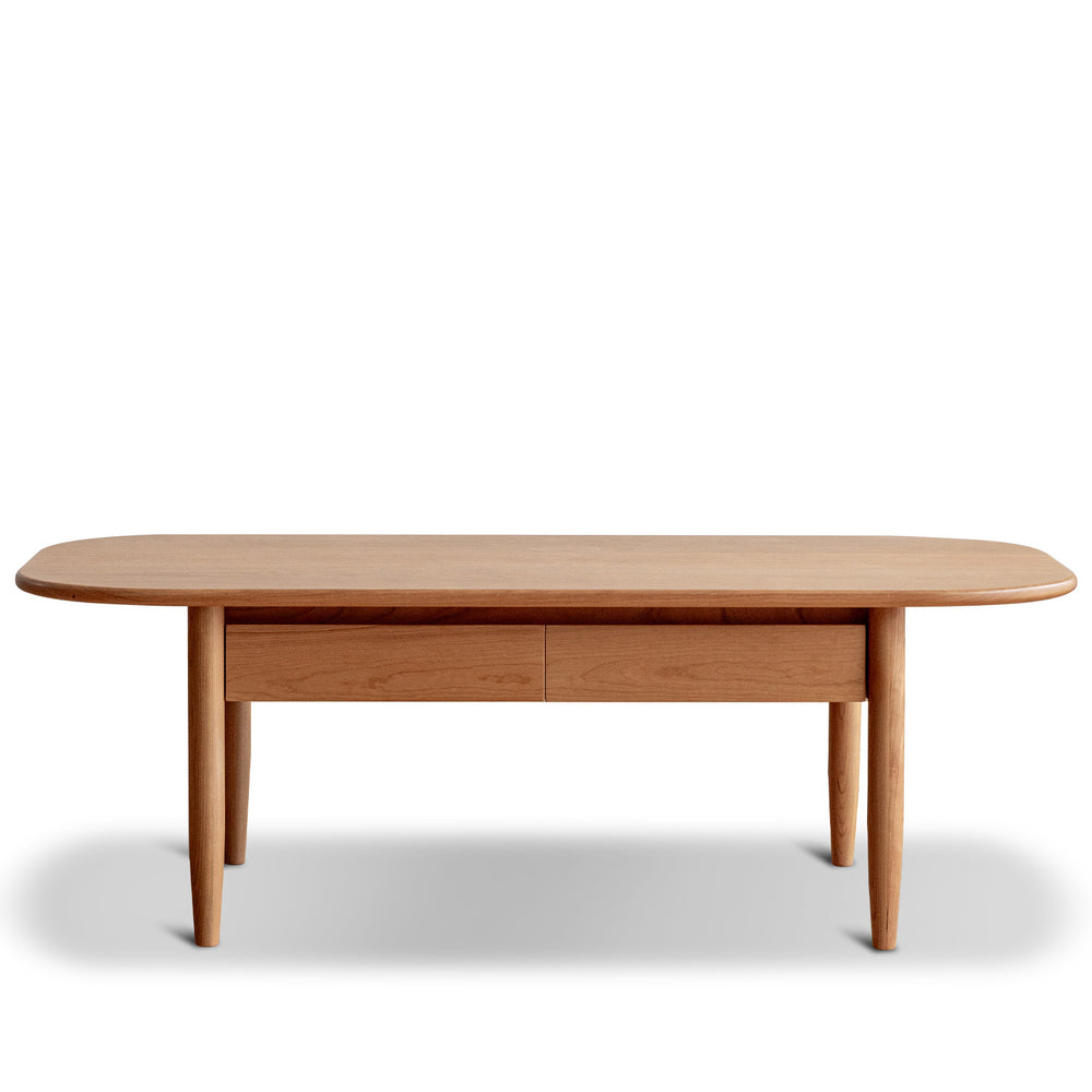 Scandinavian cherry wood coffee table vista in white background.