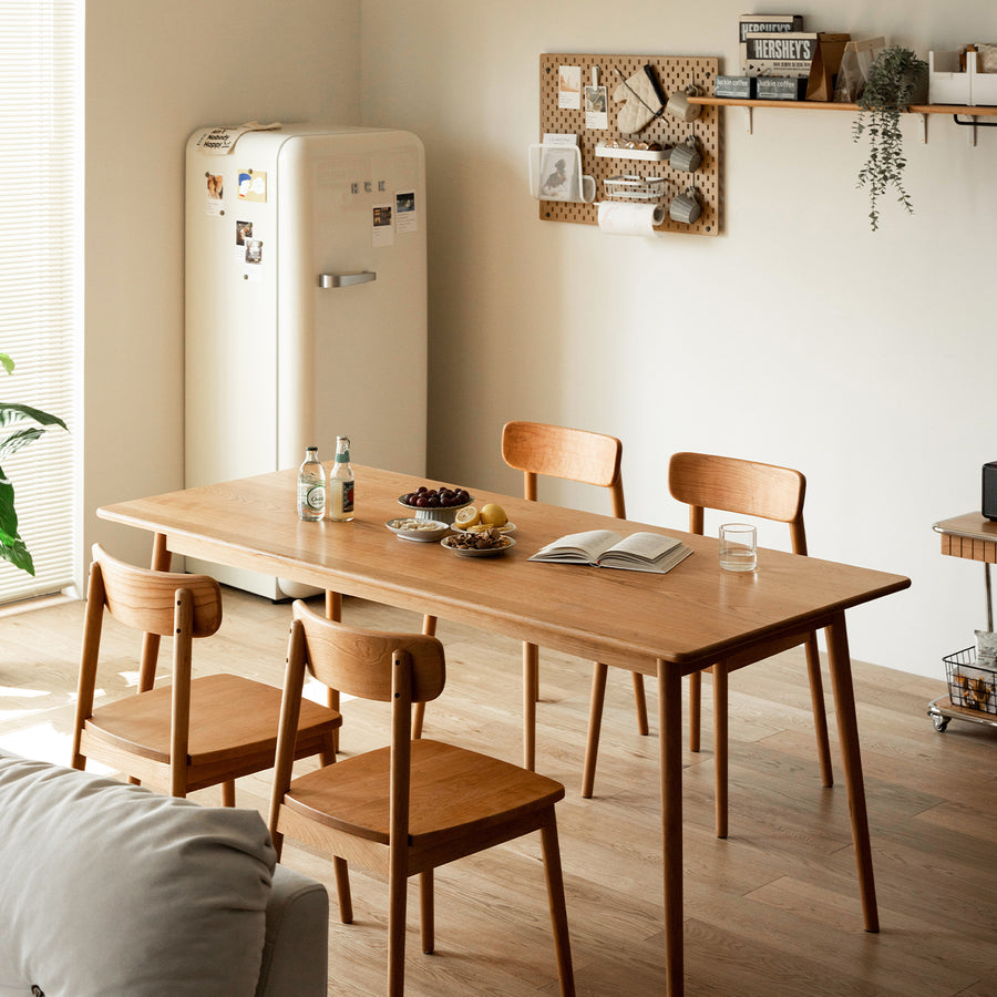 Scandinavian cherry wood dining table green primary product view.