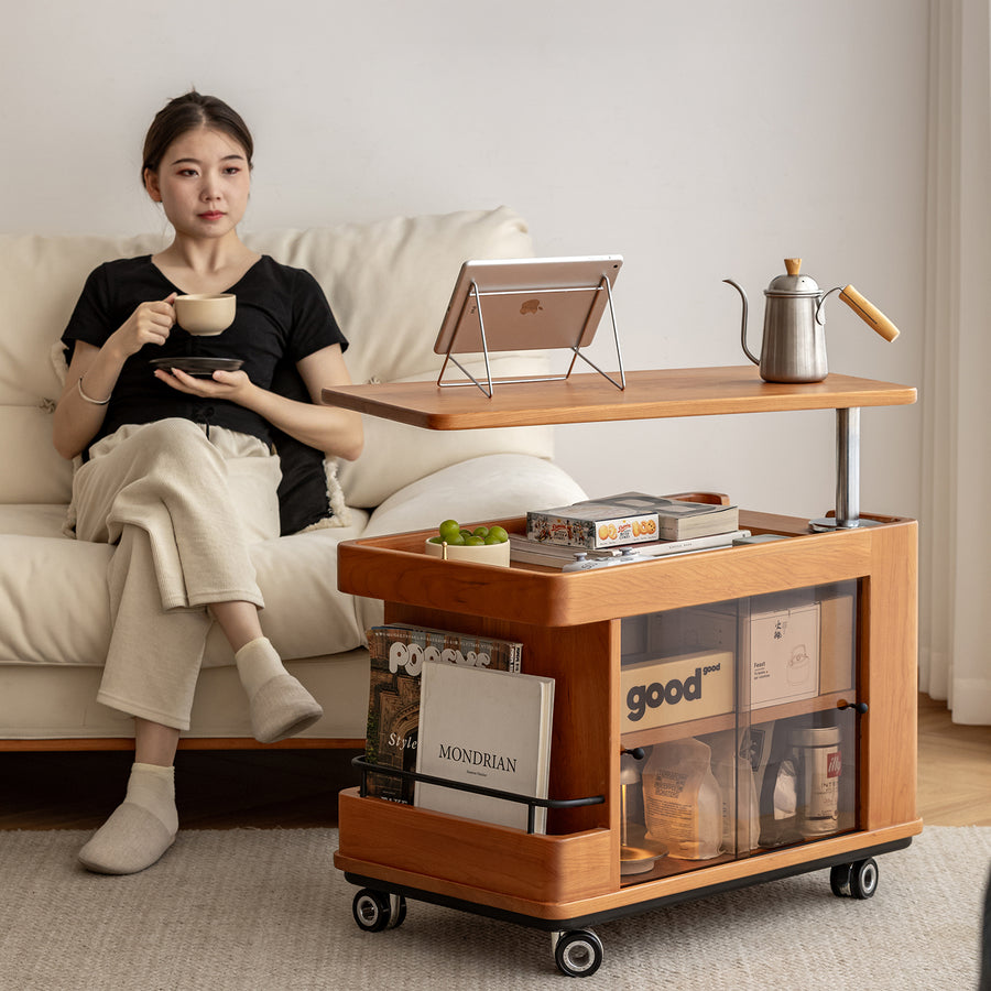 Scandinavian cherry wood wheeled trolley side table drift in real life style.