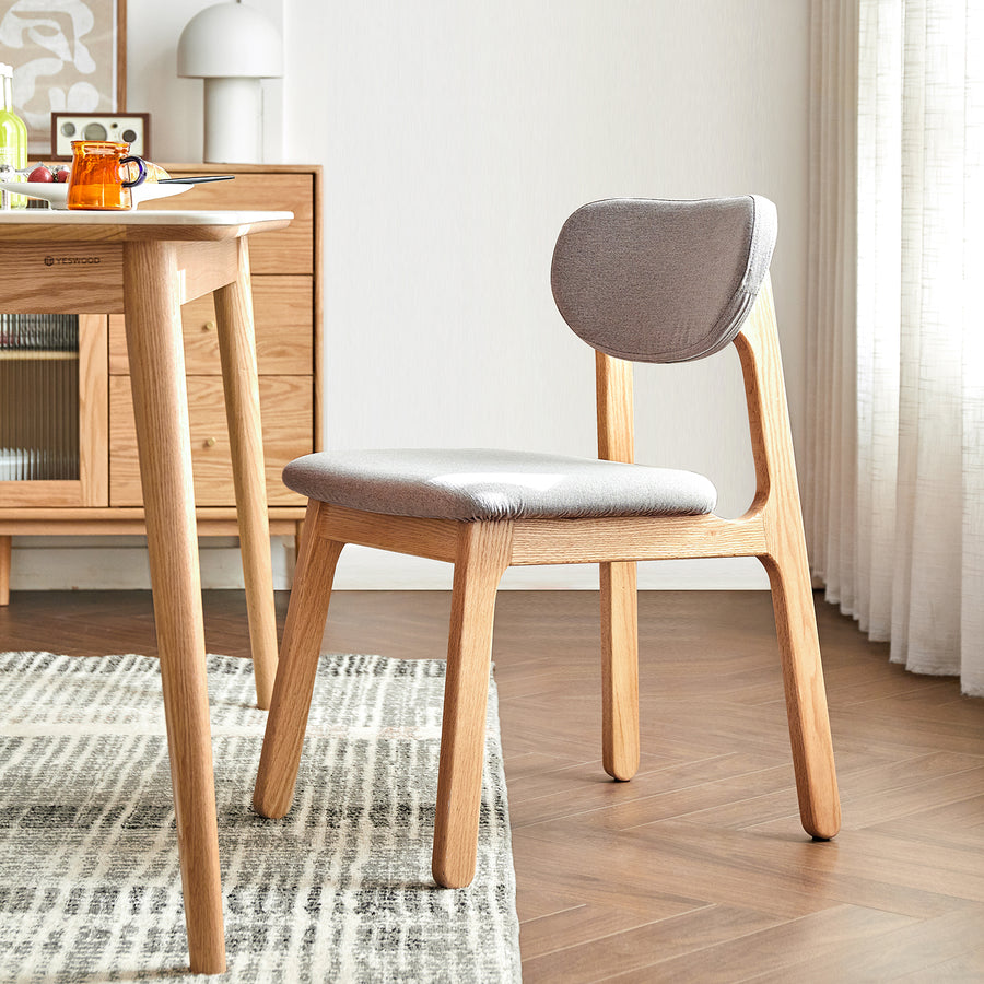 Scandinavian oak wood mixed weave fabric cover removable dining chair nest primary product view.