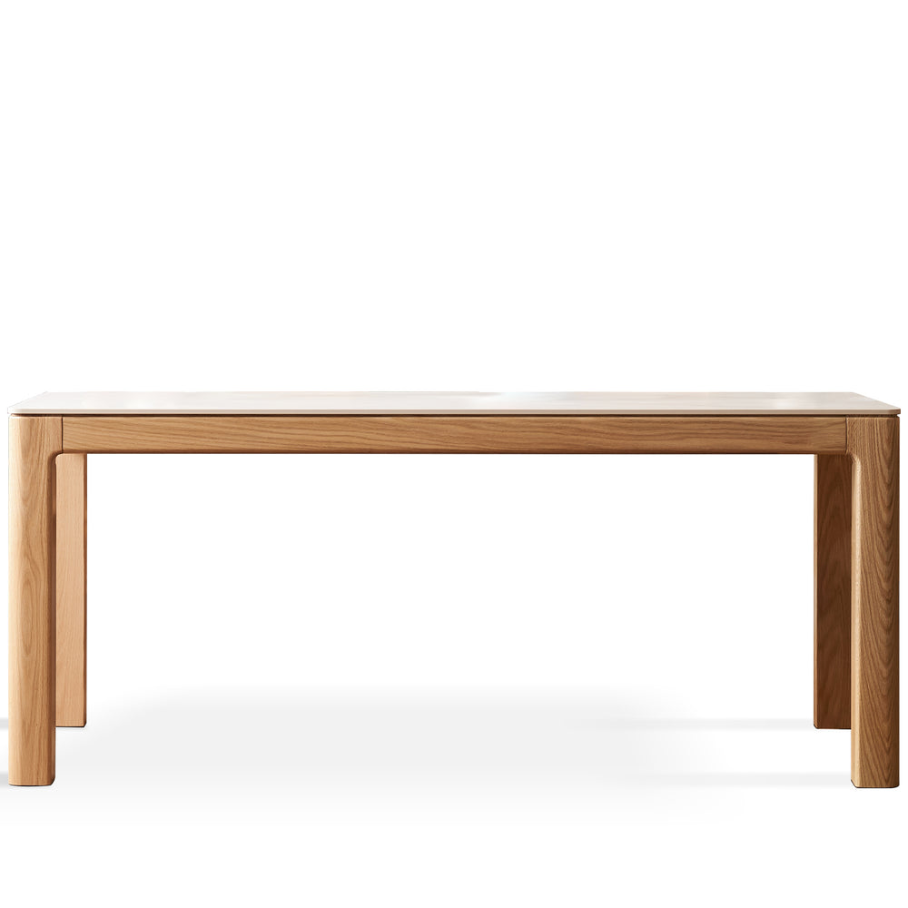 Scandinavian sintered stone dining table hulk in white background.