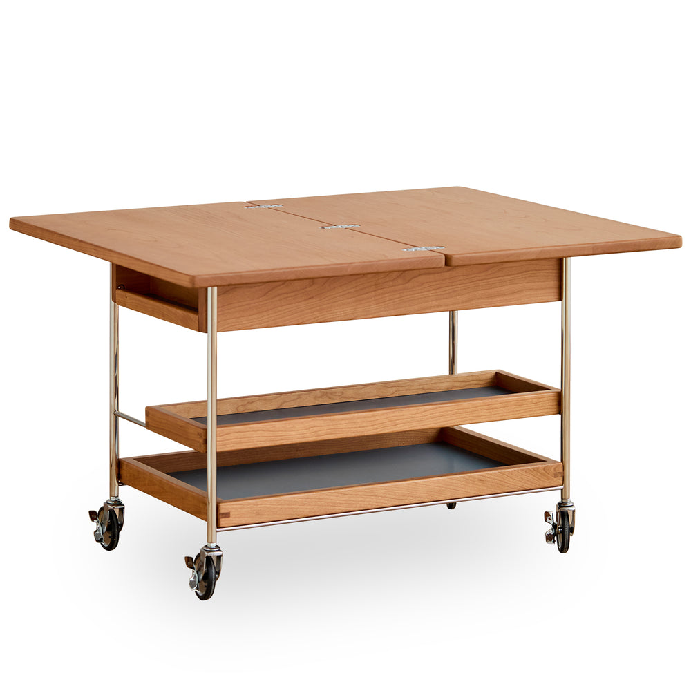 Scandinavian cherry wood extendable coffee table timeless in white background.